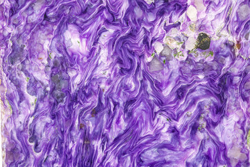 Macro stone Charoite mineral on white background