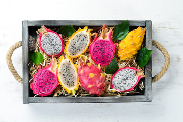 Fruit dragon on a white wooden background. Tropical Fruits.