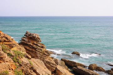 Fototapeta na wymiar Calas de Roche. Beautiful seascape with cliffs near Conil de la Frontera. Cádiz, Spain