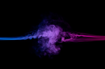 resistance of blue and red smoke in blowing motion isolated on black background