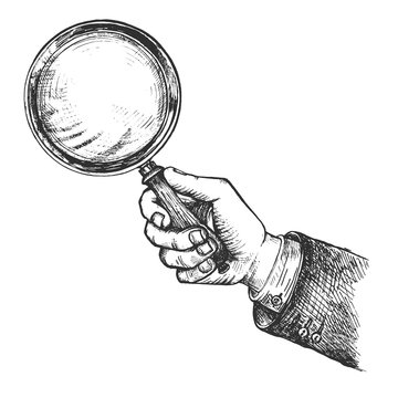 Hand holding vintage magnifying glass