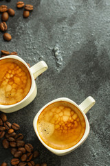 coffee, serving  beverage in a white cup (coffee grain). food. top.copy space