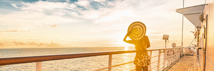 Cruise summer vacation woman watching sunset on deck banner panorama - Caribbean tropical landscape travel lifestyle.