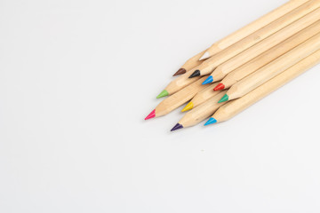 Obraz premium Color pencils are on the white table.
