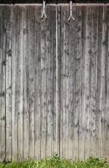 An old weathered wooden board wall, background or texture.
