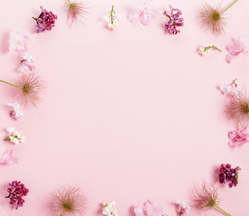 Festive flower composition on the white wooden background. Overhead view
