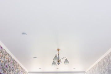 Stretch matte ceiling in the room after repair