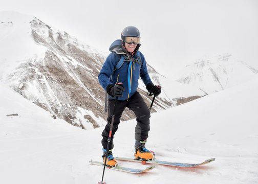 Georgia, Caucasus, Gudauri, confident man on a ski tour