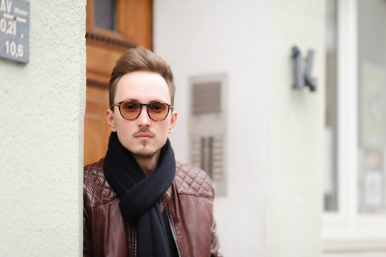 Portrait of young fashionable man wearing sunglasses