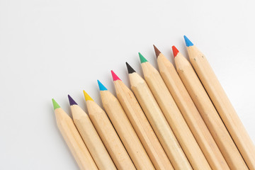 Obraz premium Color pencils are on the white table.