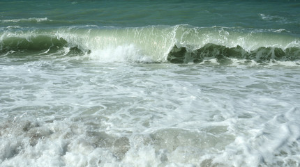 waves crashing on the beach