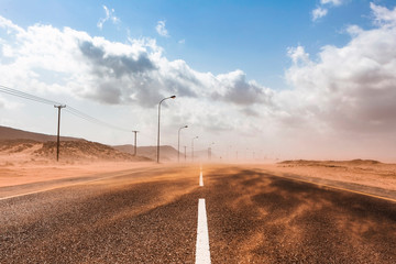 Sultanate Of Oman, Ras al Hadd, Desert road in a sand storm