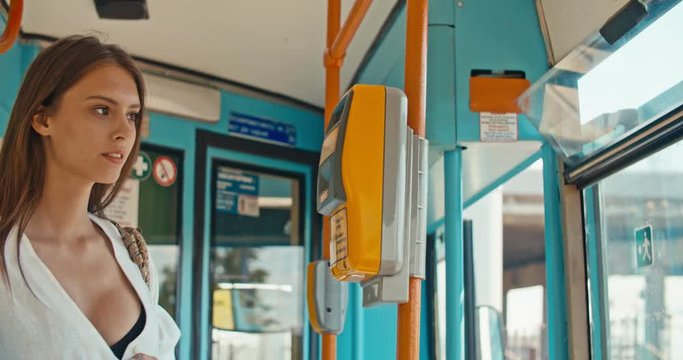 Woman paying for the public transport