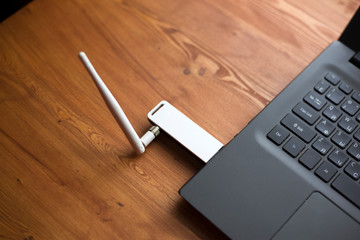optional removable router to enhance the signal on a laptop