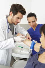 male medical professional holding arm of a retired patient