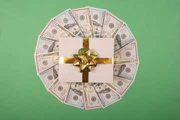 Gift on mandala kaleidoscope from money. Abstract money background raster pattern repeat mandala...