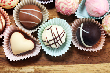 a lot of variety chocolate pralines, belgian confectionery gourmet chocolate praline.