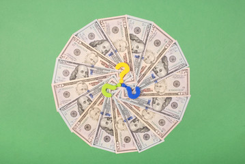 Question mark on mandala kaleidoscope from money.