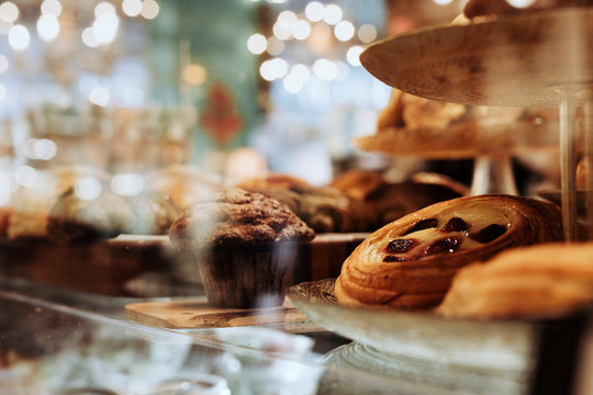 Freshly baked breads and pastries on a display counter