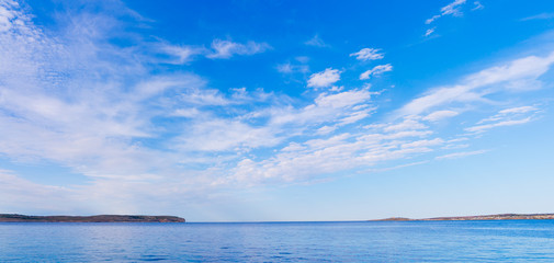 Panoramic view of Comino   from Malta.Sea sunset with colorful cloud..