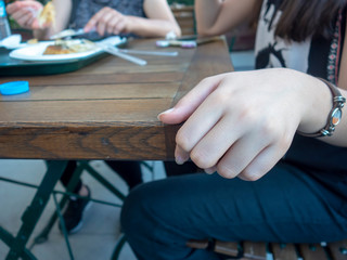 Young Women Eat Turkish Sweet Kunefe with Pistachio