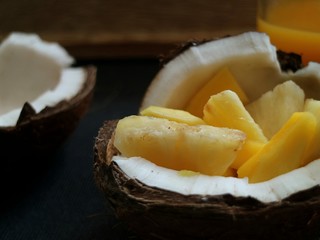 Coconut filled with tropical fruit