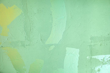 Trendy mint colored low contrast Rough Concrete textured background with traces of paint to your...