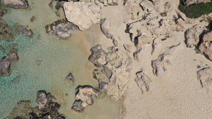 Aerial drone top view photo of famous paradise sandy deep turquoise beach of Falasarna in North West Crete island, Greece