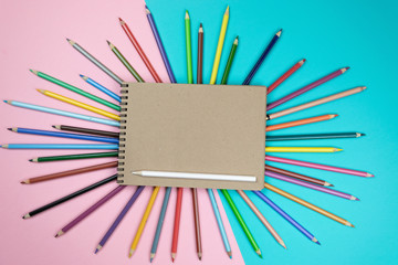 Brushes, colored pencils, notebook mock up for artwork. Blank objects for placing your design....
