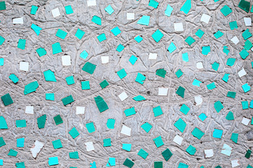 Closeup of trendy mint coloured abstract mosaic ceramic tiles patterned background