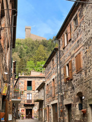 Fototapeta na wymiar Radicofani, a medieval village with a castle and stone houses located on a Tuscan hill, Italy.