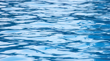 reflection of the sky in the wind on the water. abstraction in nature.