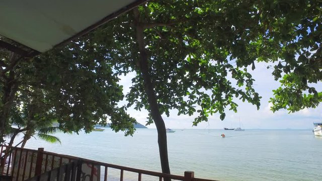 Pan Right: Dock And Ocean View From Porch Under Shady Trees - Ko Samui, Thailand