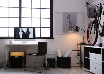 Stylish room interior with modern bicycle. Hipster design