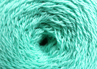 Clew of knitting threads as background, top view. Sewing stuff