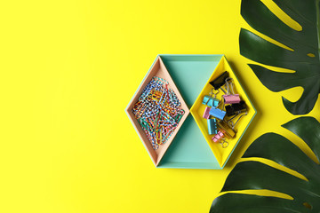 Stylish tray with office stationery on color background. Space for text