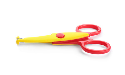 Pair of plastic scissors on white background