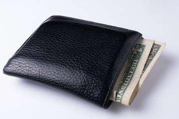 Wallet with some dollar bills