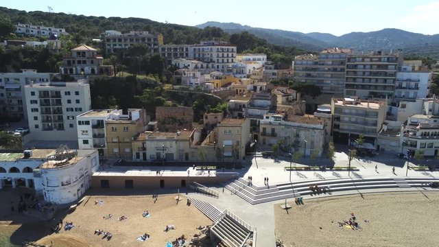 Aerial view in Sant Feliu de Guixols, coastal village of Costa Brava, Girona. Catalonia,Spain. 4k Drone Video