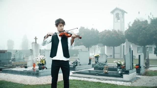 Playing violin on the funeral
