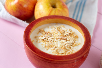 Healthy breakfast with apple yogurt and oat