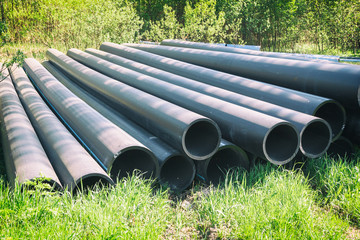 HDPE pipe for water supply at construction site construction of a water supply system plastic pipes...
