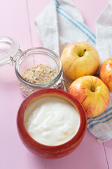 Healthy breakfast with apple yogurt and oat