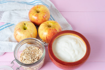 Healthy breakfast with apple yogurt and oat