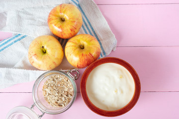 Healthy breakfast with apple yogurt and oat
