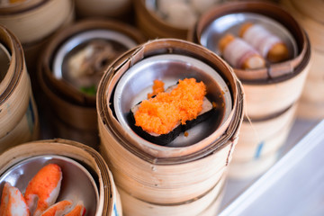 yumcha, dim sum in bamboo steamer, chinese cuisine