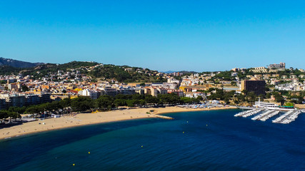 Obraz premium Aerial view in Sant Feliu de Guixols, coastal village of Costa Brava, Girona. Catalonia,Spain.Drone Photo