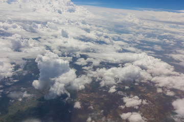 Fototapeta na wymiar Blue sky with clouds shoot on the airplan
