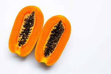 Ripe papaya fruit on white background.