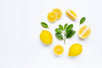 Lemon and slices with leaves isolated on white